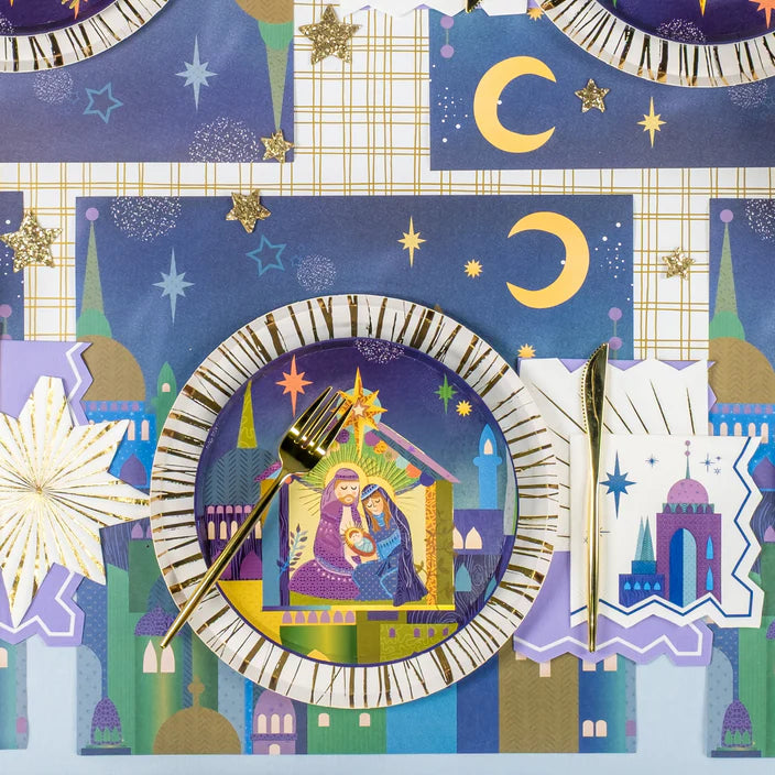 Single place setting with gold fork and crescent-moon mat