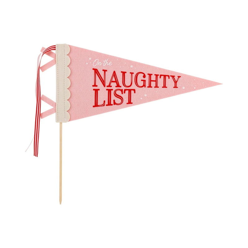 Pink ‘On the Naughty List’ felt Christmas pennant with scalloped edge and ribbon ties on wood dowel.