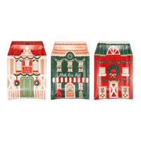Set of three North Pole plates featuring Santa’s Workshop, North Pole Post, and Reindeer Barn designs
