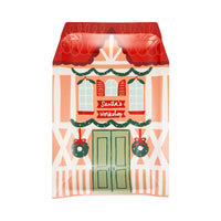 Close-up of Santa’s Workshop plate with green doors and red roof