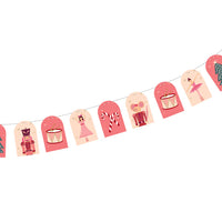 Close-up of assembled garland with Nutcracker, Clara, drum, candy cane