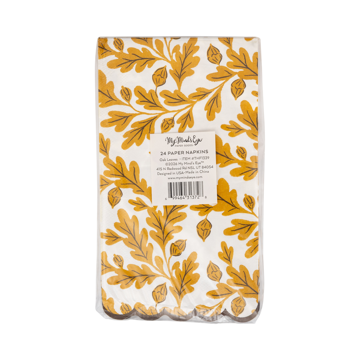 Back side of a pack of paper napkins with yellow and brown leaf pattern on a transparent packaging with My Mind's Eye label