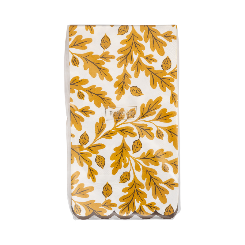 Stack of 24 oak leaf dinner napkins on a clear packaging, front view.