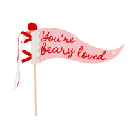 Felt Valentine pennant reading “You’re Beary Loved” in pink and red with wooden dowel