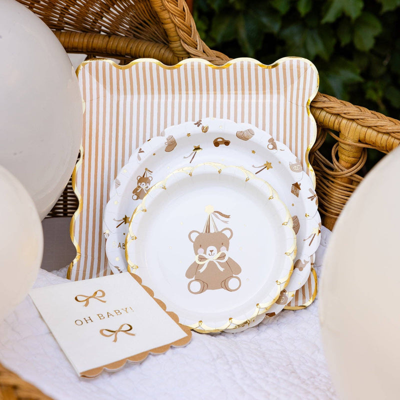 Oh Baby gold and tan napkins styled in baby shower party