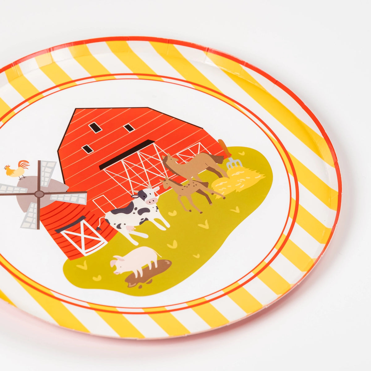 Single farm dinner plate showing full barnyard scene with striped border.