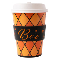 Orange argyle paper hot cup with a white lid and a black sleeve printed with orange Boo script and stars