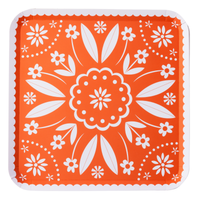 bright orange fiesta paper plate with bold floral folk pattern
