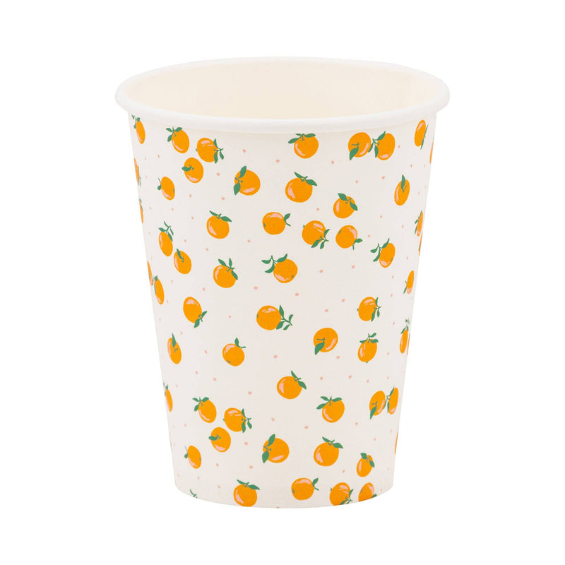 Orange print paper party cup with small citrus illustrations on a cream background.