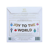 Front of the ornament garland kit packaging showing die-cut ornaments and a "Joy to the World" gold-lettered design.
