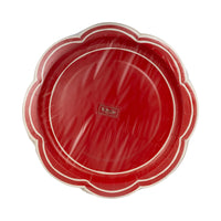 Front of the packaged set of 8 red paper plates displaying the large scalloped design.