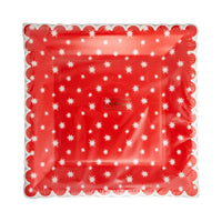 Front of the package containing 8 shaped paper plates in the red star pattern.