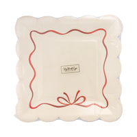 Front of the package containing 8 square paper plates with the bow border design.