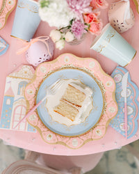 Parisian Princess plate styled on a pink table with a slice of cake