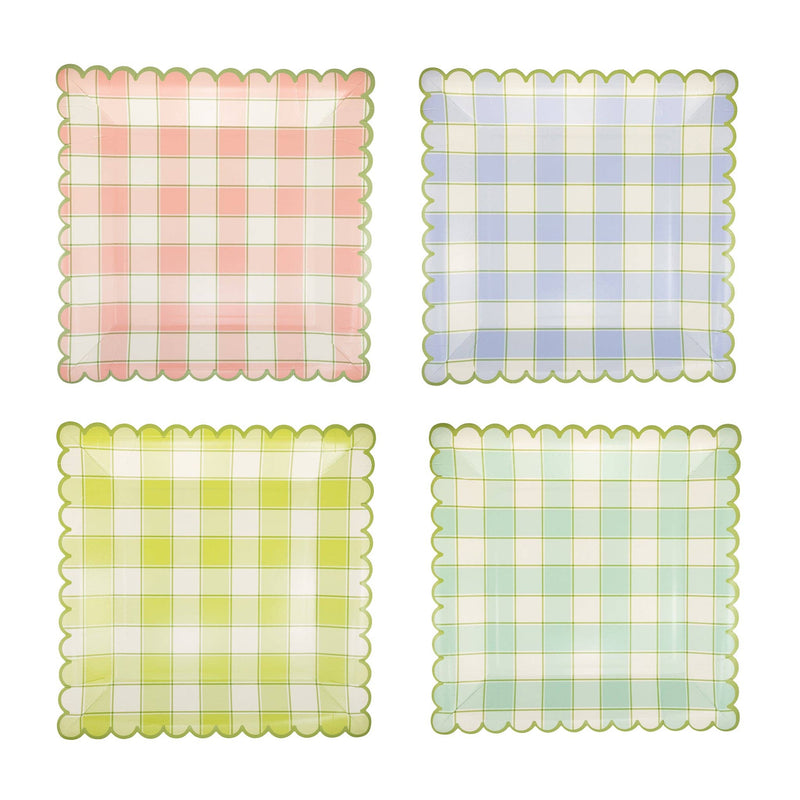 Four square paper plates in pink, blue, yellow, and green pastel plaid patterns with green scalloped edges for an Easter brunch.