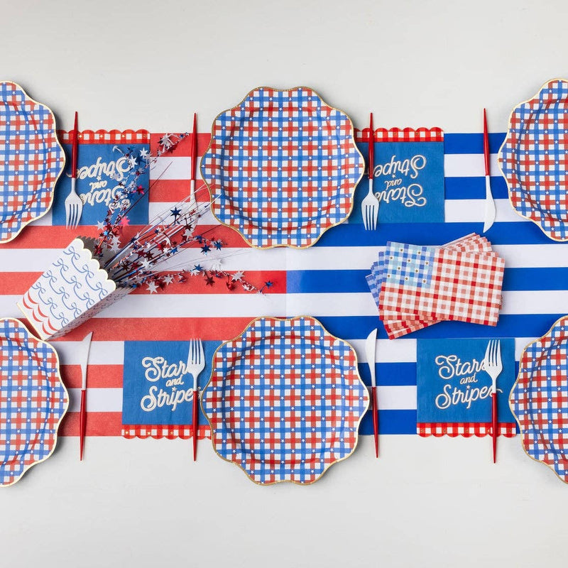patriotic 4th of july dinner plates styled on table with coordinated decor.