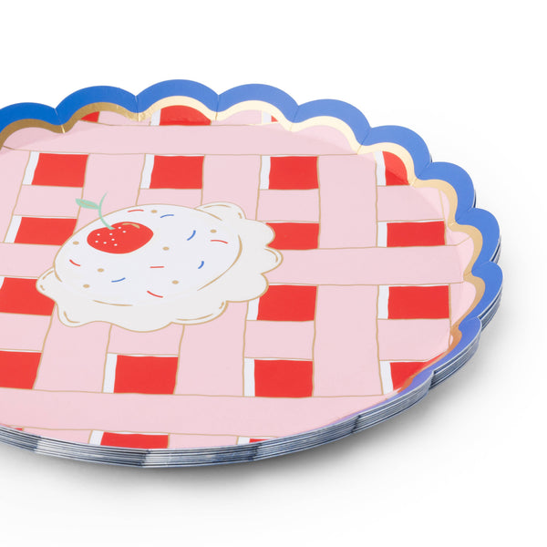 stack of cherry pie dessert plates showing patriotic design and gold trim detail.