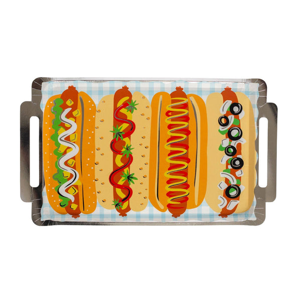 Full product shot of the hot dog platter-shaped paper plate on a white background. Rectangular shape with two silver foil cutout handles on each short end. Printed with four side-by-side hot dog illustrations on a light blue gingham ground: from left, a relish-mayo dog, a ketchup-strawberry dog, a mustard-ketchup swirl dog, and a Chicago-style dog with black olives and onion rings.