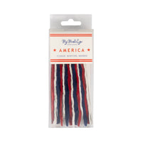 Front of packaging for America tissue bunting banner by My Mind's Eye showing red cream and blue tissue paper fans in clear retail box