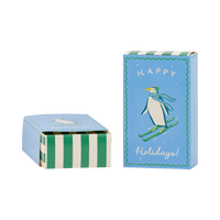 Blue Happy Holidays treat box with skiing penguin shown open and closed