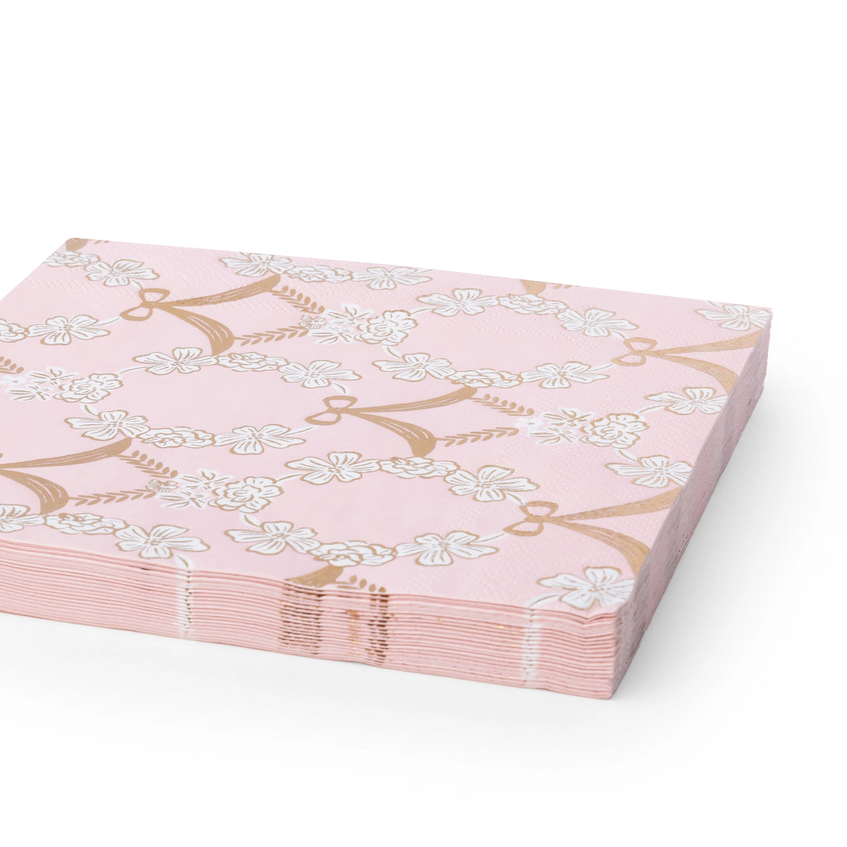 Petal pink Rococo napkins shown folded and stacked at an angle