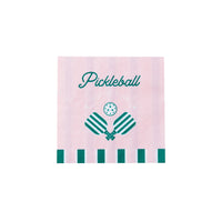 Pink napkin with ‘Pickleball Social Club,’ paddles and ball—easy pickleball party decorations.