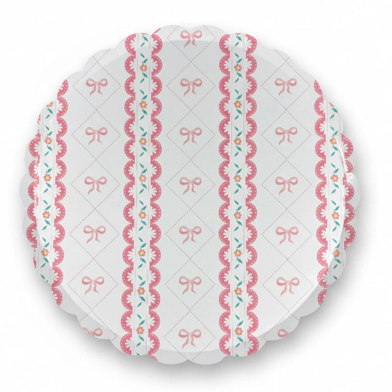Single 10-inch paper plate with pink bow lattice and scalloped edge