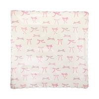 Single Pink Bow Print Square Paper Plate on white background showing cream background with all-over pink ribbon bow print in multiple shades of pink and a scalloped square edge