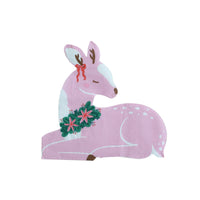 Pink deer shaped napkin with a poinsettia garland and red bow on a white background