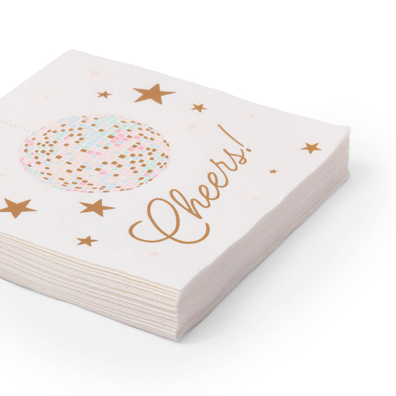 Stack of pink disco ball party napkins with foil detail, styled for a bachelorette or disco birthday party