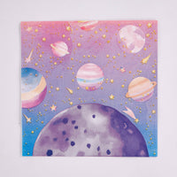 Single pink and purple galaxy paper lunch napkin flat, showing planets, stars and a moon