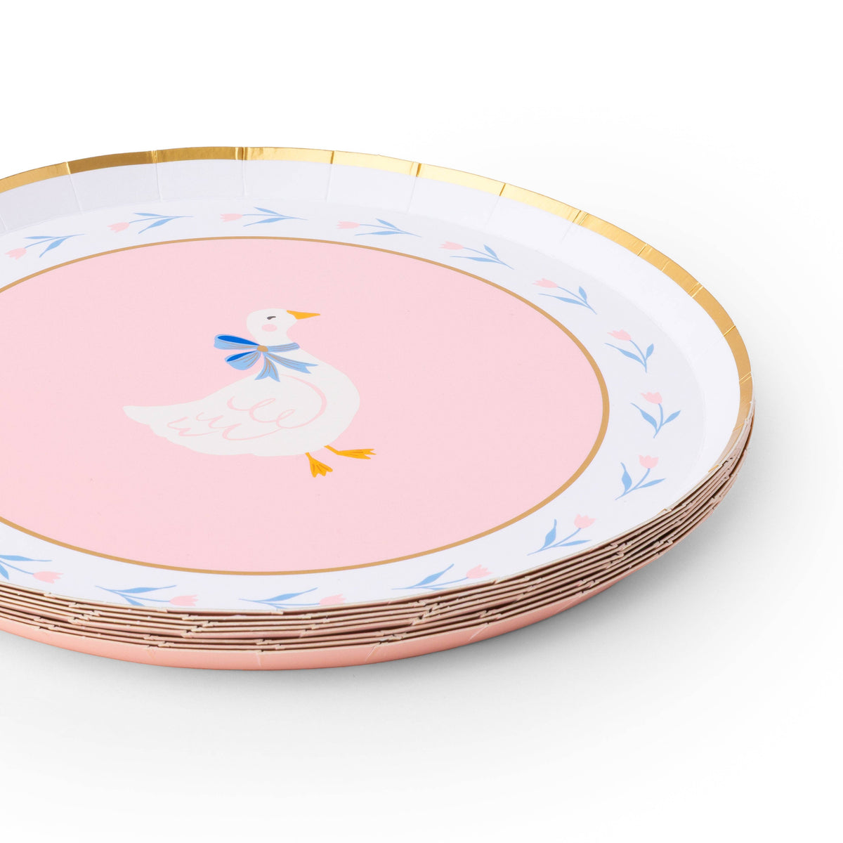 Stack of pink goose dessert plates with gold rim detail.