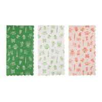 Three Pink and Green Christmas dinner napkin designs shown side by side