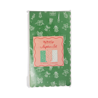 Pink and Green Christmas dinner napkins in retail packaging with header card