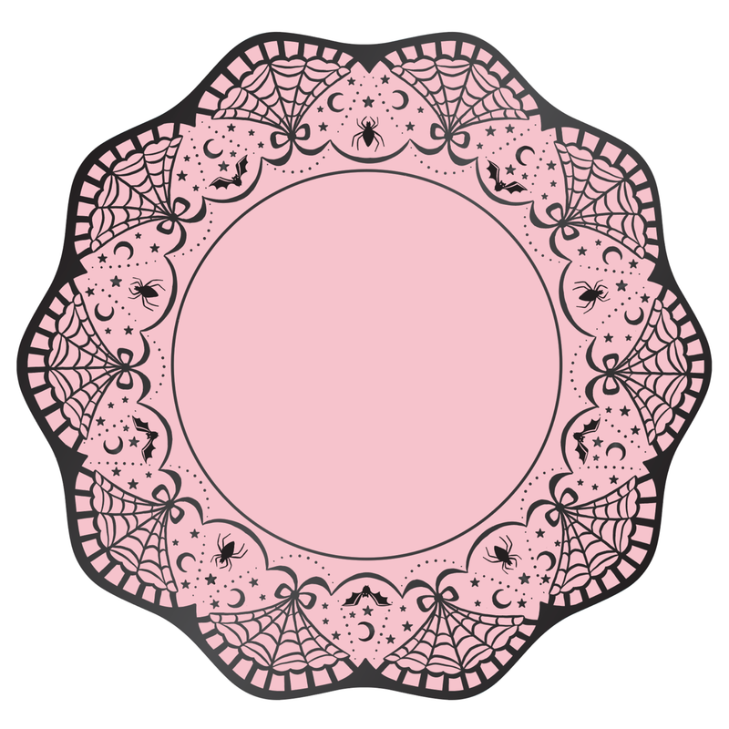 Scalloped soft-pink Halloween dinner plate with an intricate black lace border of spiderwebs, bats, spiders, crescent moons, bows, and stars around a clean pink center, overhead view on white background.
