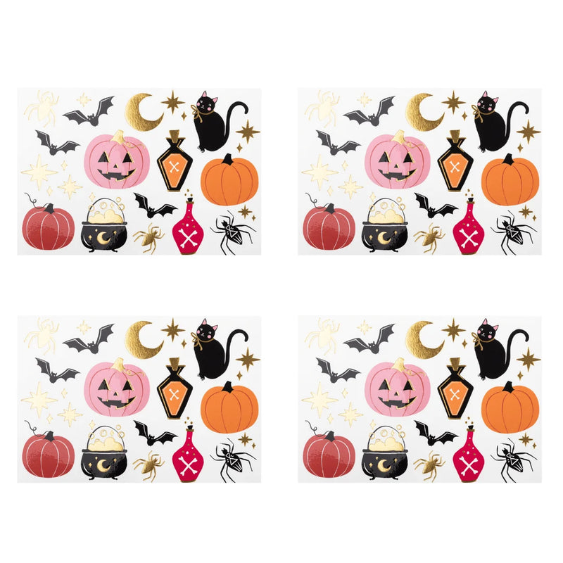 Pink Halloween paper napkin scattered with pink orange and red pumpkins, a black cat, bats, spiders, a cauldron, potion bottles, and gold moon and stars.