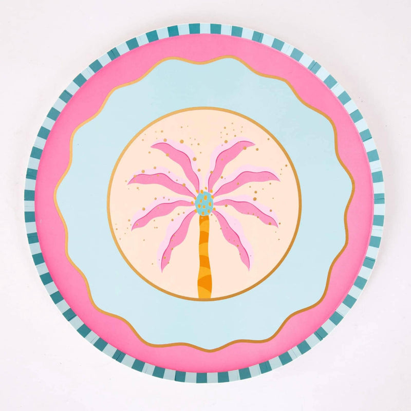 Single pink palm tree paper dessert plate with a hot-pink palm, sand center, pink wave scallop, and teal striped rim.