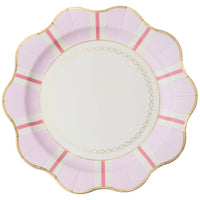 Soft petal pink dinner plate with a Regency stripe, a delicately scalloped gold-trimmed rim, and a pearl inner border, shown stacked at an angle on white.