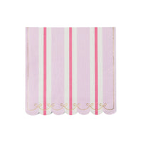Soft petal pink napkin with a Regency stripe in pink and cream and a wavy scalloped edge, front view on white background.