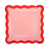 Pink and red ric rac scalloped square paper plate on white background