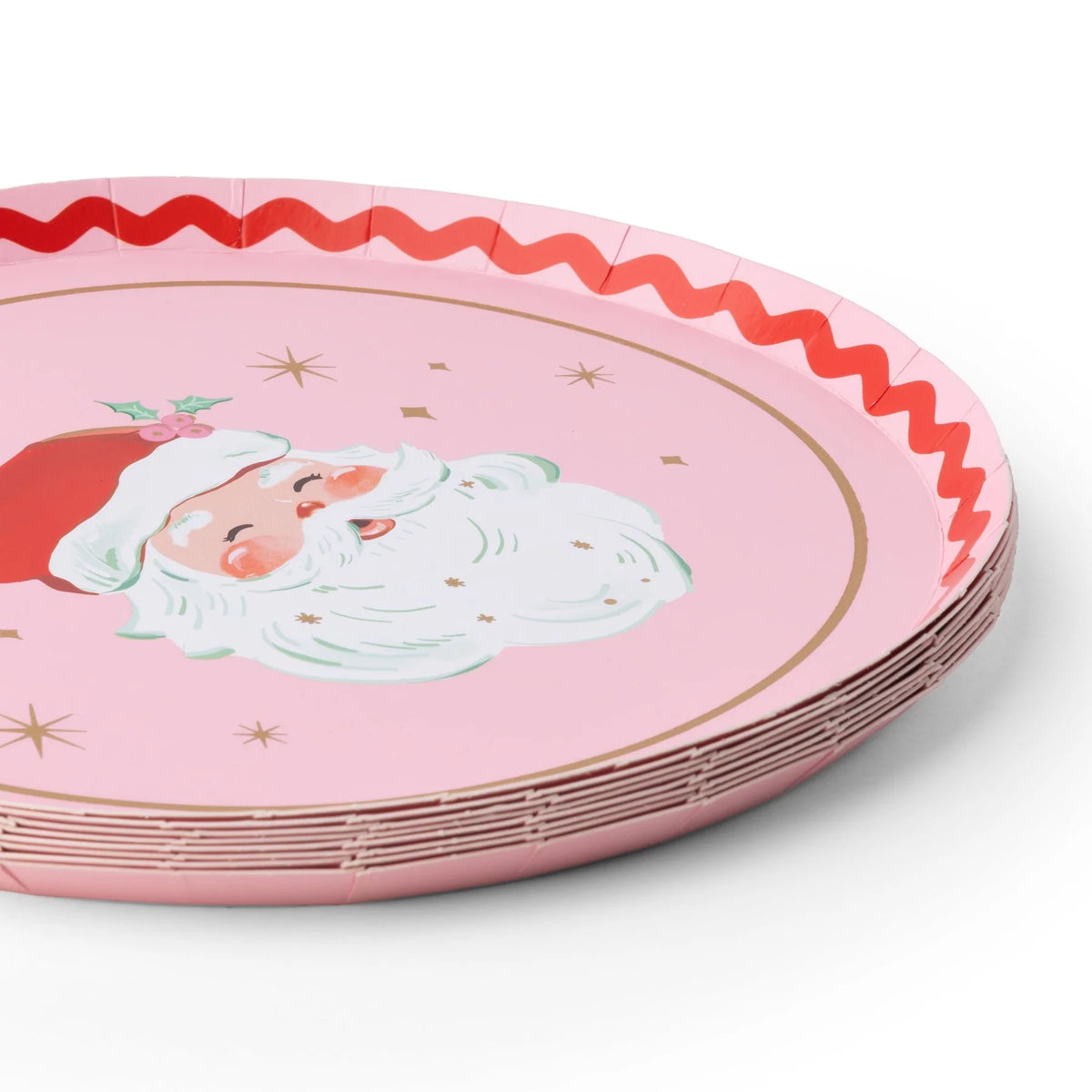 Angled stack of pink Santa paper dessert plates showing the red rickrack edge