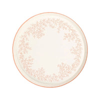Pink floral dessert plate with scalloped edge and botanical wreath