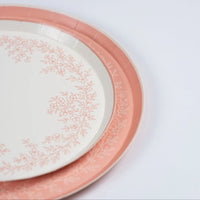 Close-up of pink floral plates