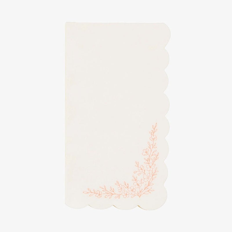 Single ivory guest towel with a scalloped edge and pink floral corner spray