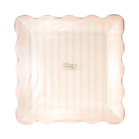Packaging of pink striped scalloped edge paper plates