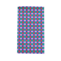 Top-down studio shot of a rectangular paper guest towel featuring a modern woven checkered pattern in pink, teal, and red.