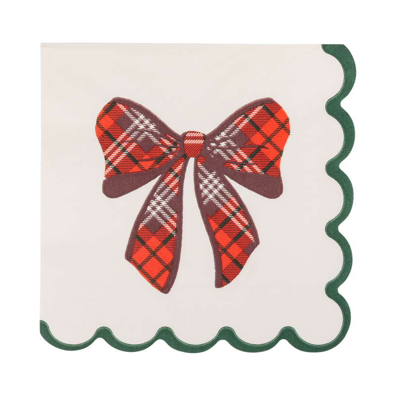 Cream paper cocktail napkin with red tartan plaid bow and green scalloped edge
