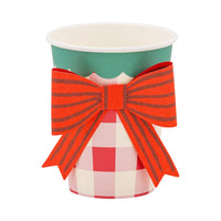 Plaid party cup with green scalloped rim and red paper bow