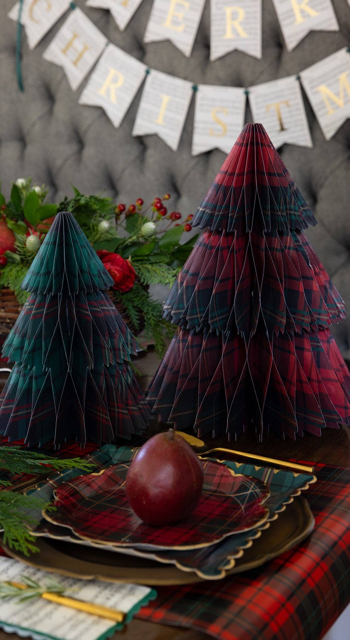 Plaid honeycomb Christmas tree styled on a sofa with greenery