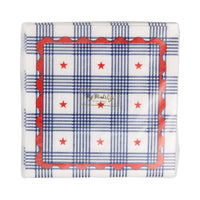 Front of plaid stars paper cocktail napkin package with gold foil logo
